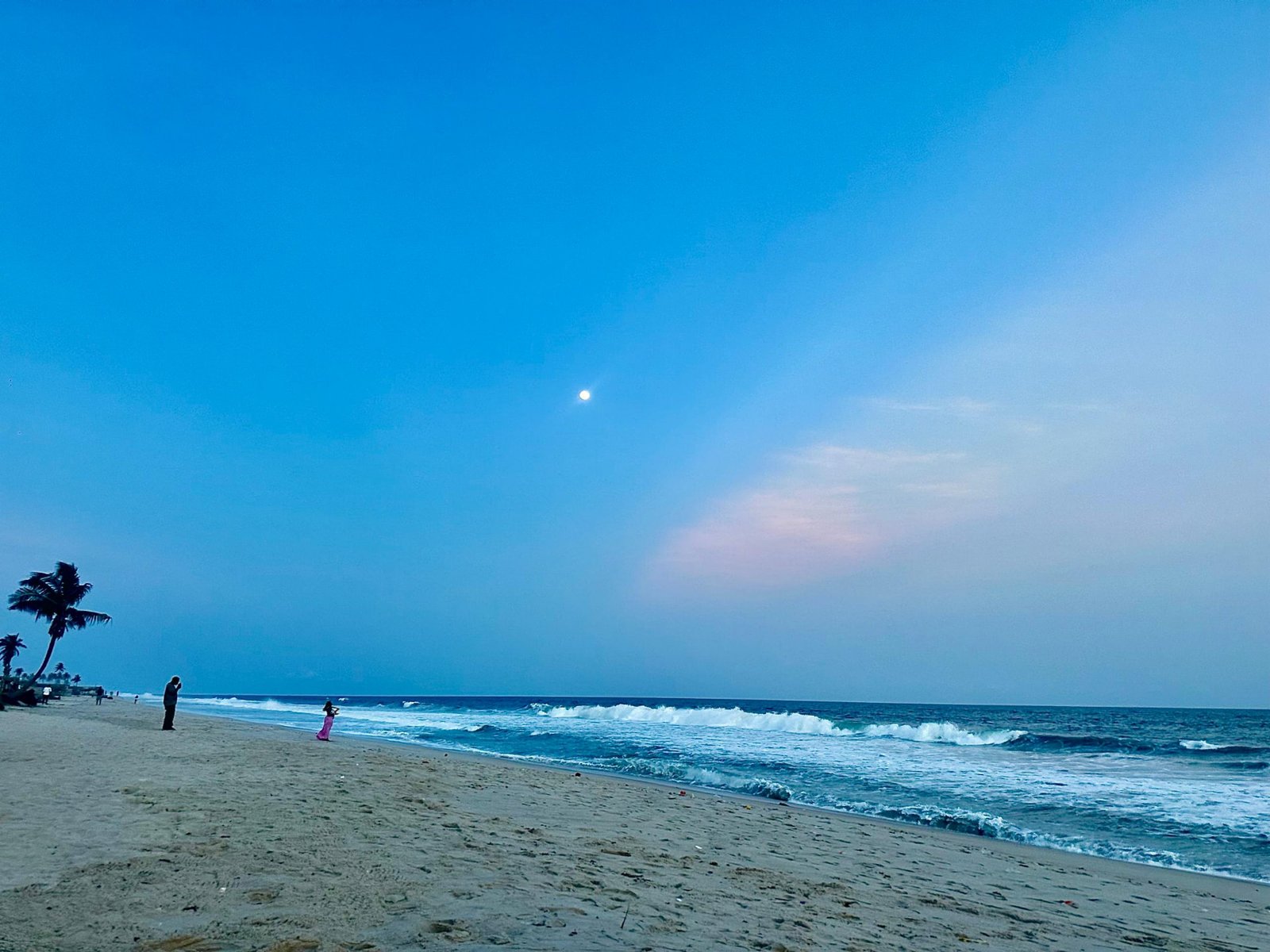 The shoreline at Jet Beach Club with the moon over the Atlantic